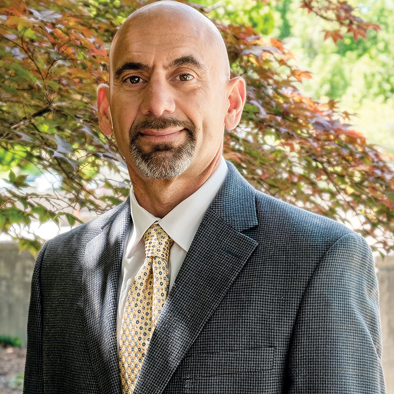 Dr. John Stella